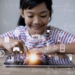 Asian little girl using tablet Education technology. EdTech.